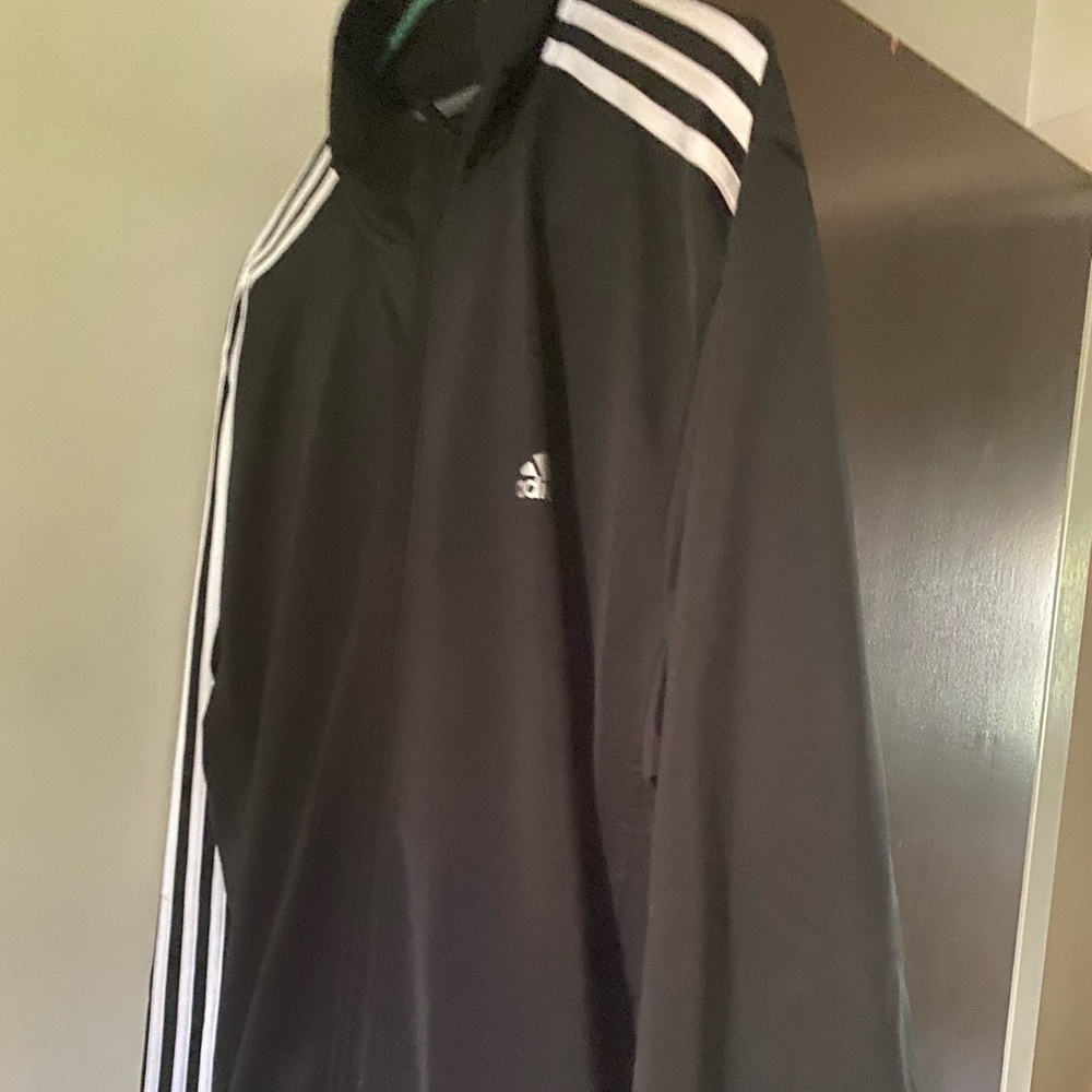 Men’s Adidas tracksuit top.